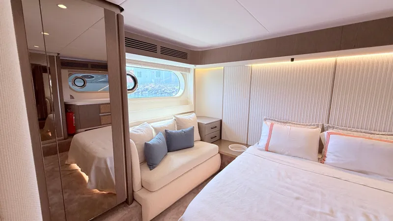  Yacht Photos Pics Luxurious interior of 2025 Azimut Magellano 60 yacht with elegant bedroom design.