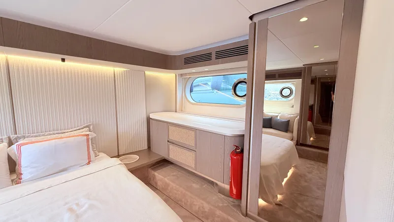  Yacht Photos Pics Luxurious interior of 2025 Azimut Magellano 60 yacht cabin with modern design and elegant furnishings.
