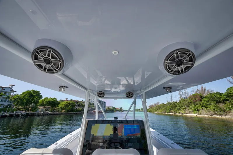 O'fishal Business Yacht Photos Pics 2025 Contender 44 ST boat interior with advanced navigation system and speakers.