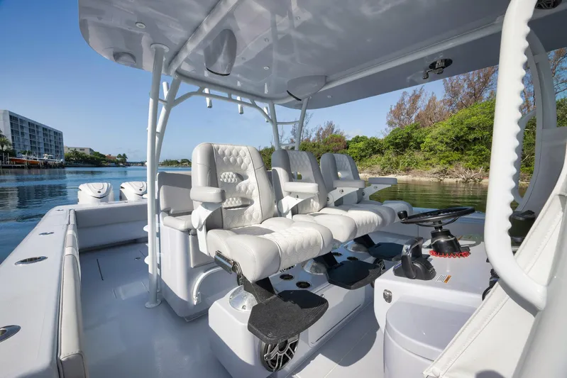 O'fishal Business Yacht Photos Pics 2025 Contender 44 ST boat interior with luxurious seating and modern design.