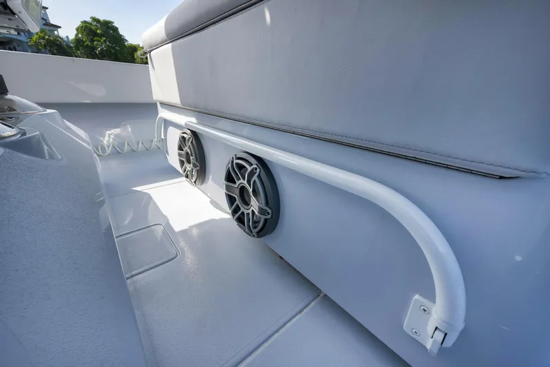 O'fishal Business Yacht Photos Pics 2025 Contender 44 ST boat interior with speakers and seating.