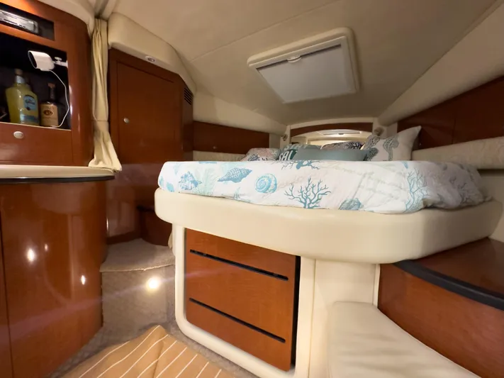  Yacht Photos Pics Luxurious cabin interior of 2005 Sea Ray 340 Sundancer yacht with cozy bed.