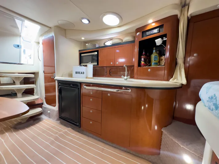  Yacht Photos Pics Luxurious 2005 Sea Ray 340 Sundancer yacht interior with modern kitchen amenities.