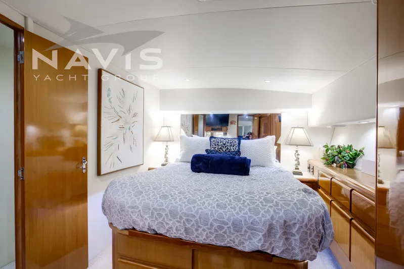 Covert Mission Yacht Photos Pics Luxurious master stateroom interior with elegant decor and lighting.