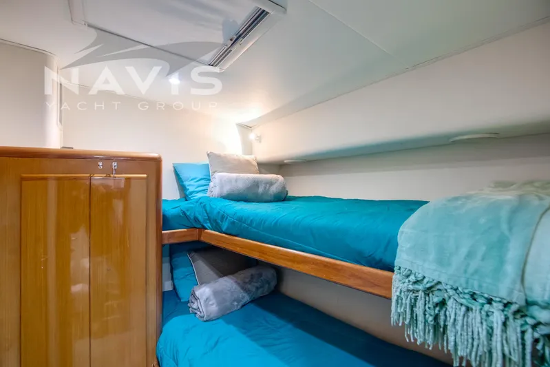 Covert Mission Yacht Photos Pics Crew bunkroom bunk beds and cedar hanging closet with under bunk storage