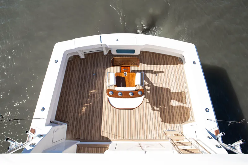 Covert Mission Yacht Photos Pics Aerial view of 1998 Viking 58 Convertible yacht's teak deck and fishing chair.