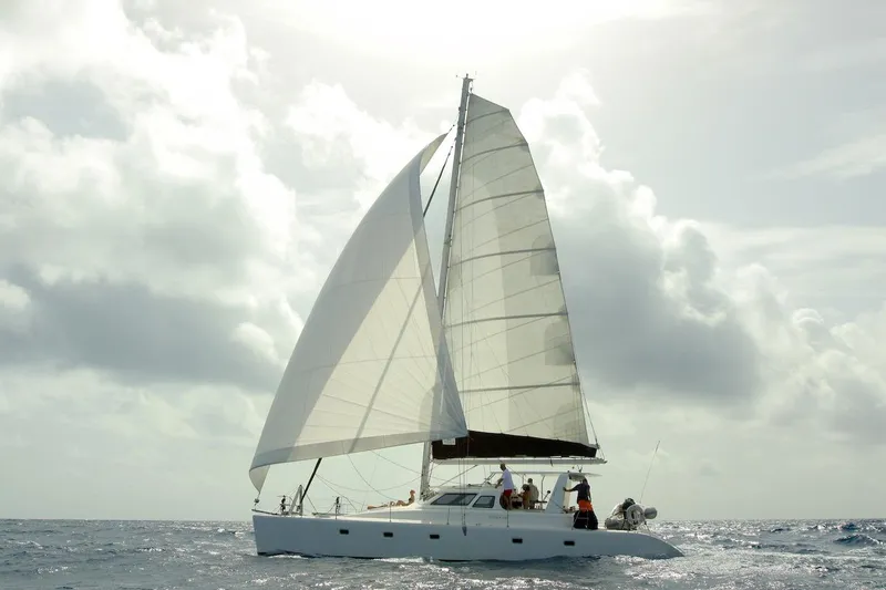 Osprey Yacht Photos Pics Sailing yacht Voyage Yachts 520, 2011 model, cruising on open sea under cloudy skies.