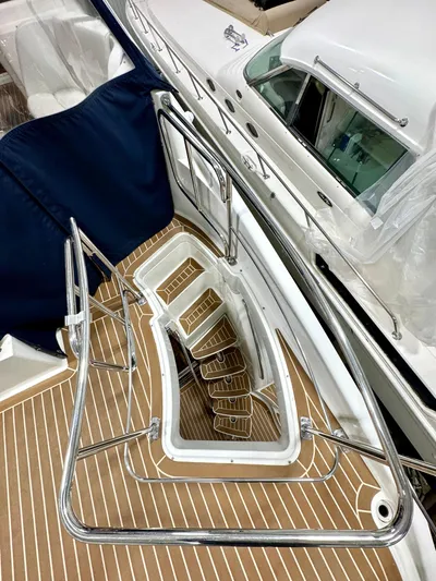 Plan B Yacht Photos Pics FlyBridge Aft Stairwell to Cockpit