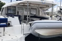 Nautitech 40 Open 2014 catamaran docked, featuring spacious deck and seating area.