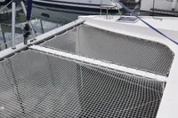 Nautitech 40 Open catamaran netting, 2014 model, docked at marina.