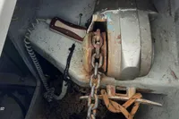 Anchor chain and windlass in a Nautitech 40 Open, 2014 model, showing signs of rust.