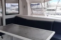 Interior of 2014 Nautitech 40 Open catamaran with seating and table.