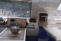 Interior of 2014 Nautitech 40 Open catamaran with kitchen and dining area.