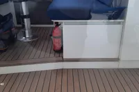 Interior of 2014 Nautitech 40 Open yacht with seating and fire extinguisher.
