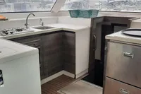 Modern kitchen interior of 2014 Nautitech 40 Open yacht with sleek design and appliances.