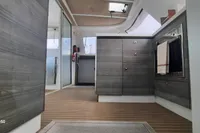 Interior of 2014 Nautitech 40 Open yacht with modern wood finish and sleek design.