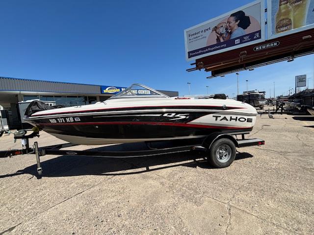 2014 Tracker Tahoe Q5 boat on trailer in outdoor dealership lot.