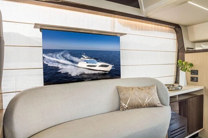 Absolute 47 Fly Yacht Photos Pics Luxurious interior of 2025 Absolute 47 Fly yacht with ocean view.