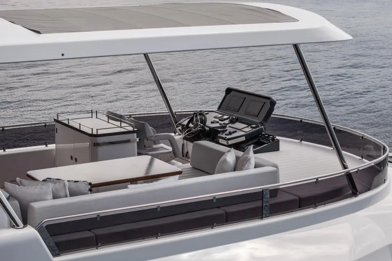  Yacht Photos Pics Luxurious Sirena 60 yacht deck with modern helm, seating, and ocean view, 2026 model.