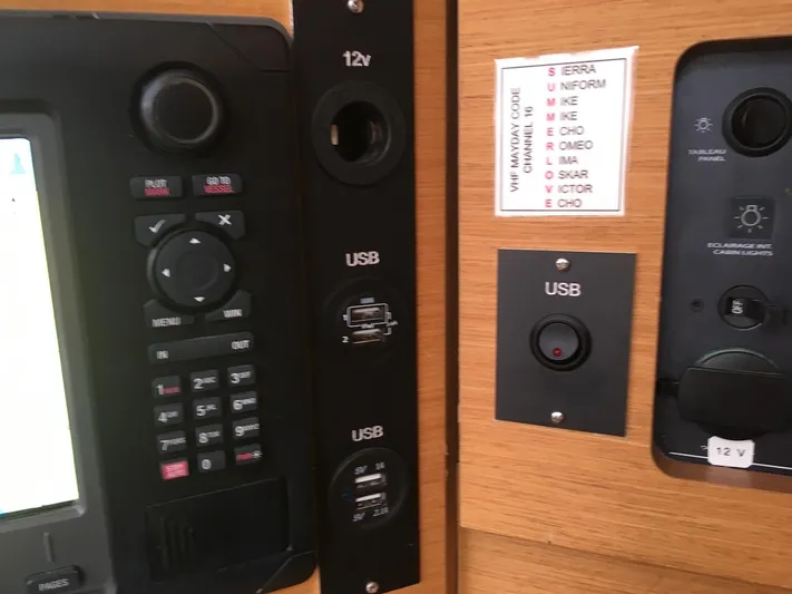 Amelie Yacht Photos Pics Control panel with USB and 12V ports on a 2011 Jeanneau 57 yacht.
