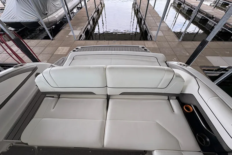  Yacht Photos Pics 2021 Formula 330 Crossover Bowrider I/O with spacious white seating at dock.