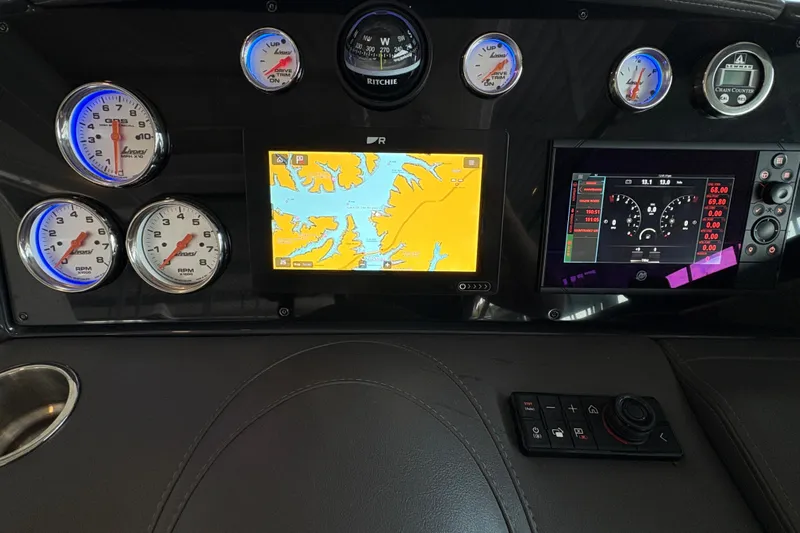  Yacht Photos Pics Dashboard of 2021 Formula 330 Crossover Bowrider I/O with navigation and control displays.