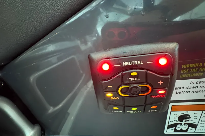  Yacht Photos Pics Control panel of 2021 Formula 330 Crossover Bowrider I/O with illuminated buttons.