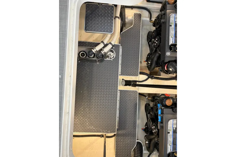  Yacht Photos Pics Engine compartment of 2021 Formula 330 Crossover Bowrider I/O with visible components and wiring.
