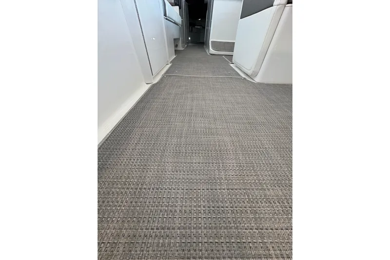  Yacht Photos Pics Interior view of 2021 Formula 330 Crossover Bowrider I/O with woven flooring.