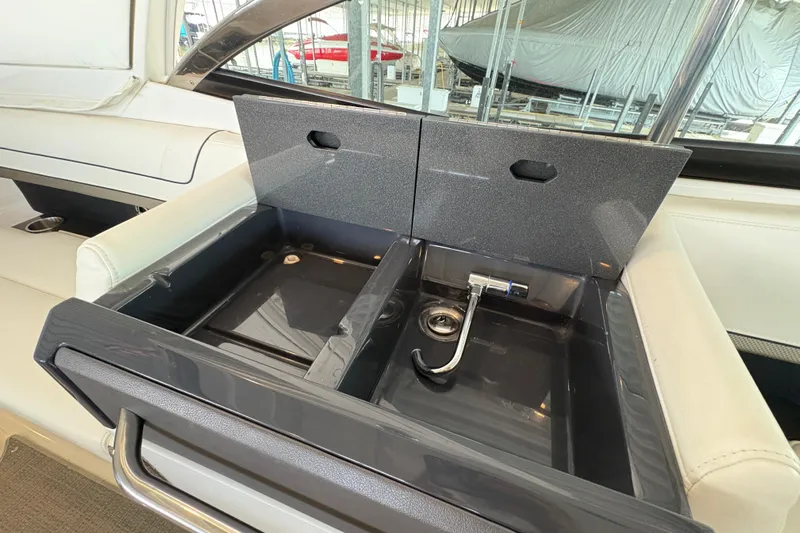  Yacht Photos Pics 2021 Formula 330 Crossover Bowrider I/O sink with modern design in boat interior.