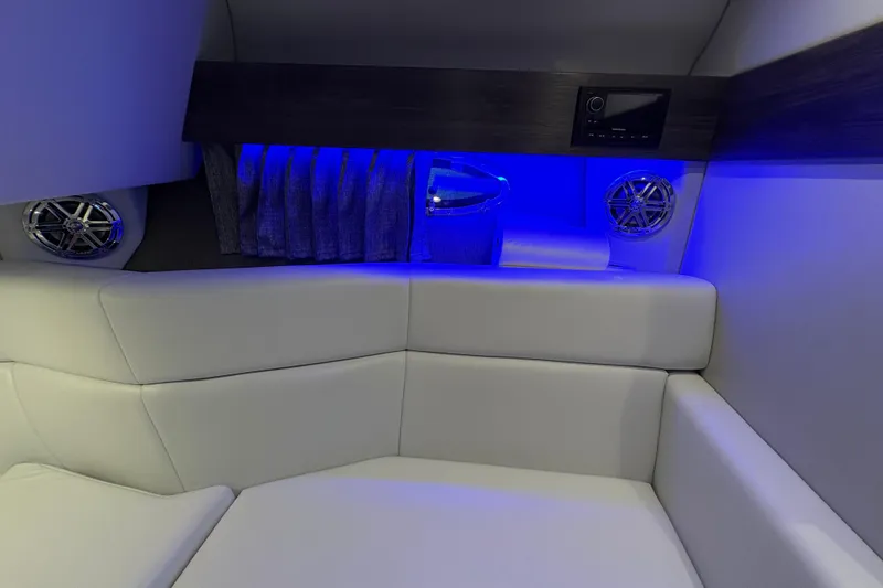  Yacht Photos Pics Luxurious interior of 2021 Formula 330 Crossover Bowrider I/O with blue ambient lighting.
