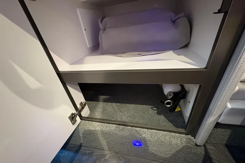  Yacht Photos Pics Open storage compartment in 2021 Formula 330 Crossover Bowrider I/O boat interior.