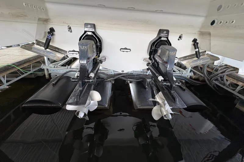  Yacht Photos Pics 2021 Formula 330 Crossover Bowrider I/O with dual outboard motors in water.