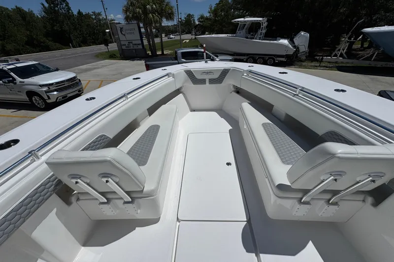  Yacht Photos Pics 2021 Invincible 36 Open Fisherman boat with spacious seating and sleek design.