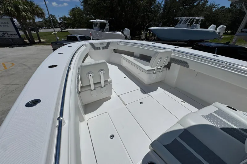  Yacht Photos Pics 2021 Invincible 36 Open Fisherman boat interior with seating and spacious deck.