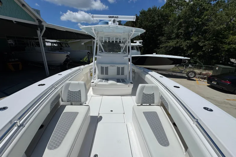  Yacht Photos Pics 2021 Invincible 36 Open Fisherman boat with spacious deck and seating.