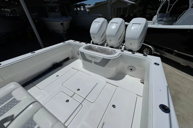  Yacht Photos Pics 2021 Invincible 36 Open Fisherman boat with triple Mercury engines, spacious deck.