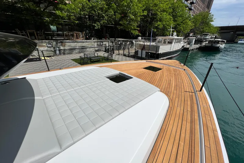  Yacht Photos Pics 2026 Pardo Yachts GT52 with sleek deck design docked by waterfront.