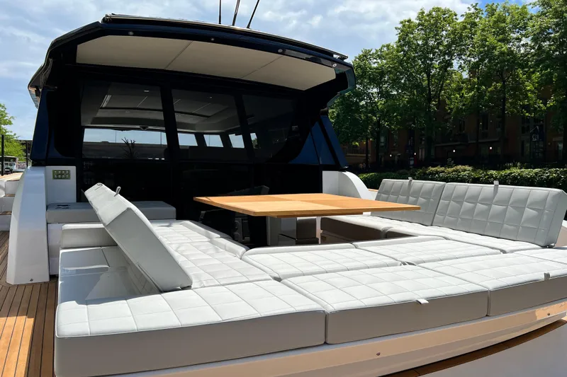  Yacht Photos Pics 2026 Pardo Yachts GT52 luxury yacht with spacious outdoor seating and dining area.