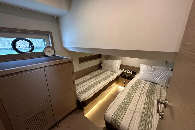  Yacht Photos Pics Luxurious twin cabin interior of 2026 Pardo Yachts GT52 with modern design and ambient lighting.