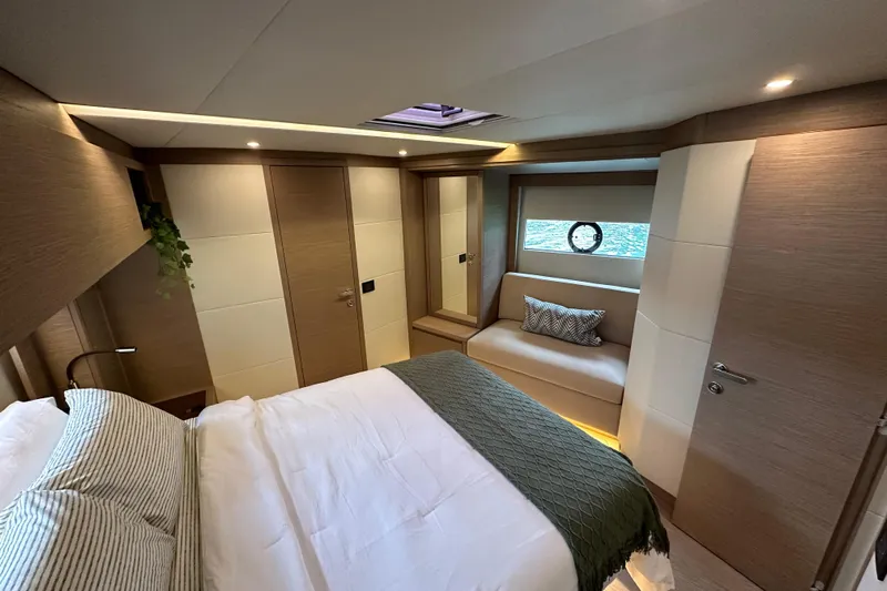 Yacht Photos Pics Luxurious bedroom interior of 2026 Pardo Yachts GT52 with modern design and elegant furnishings.