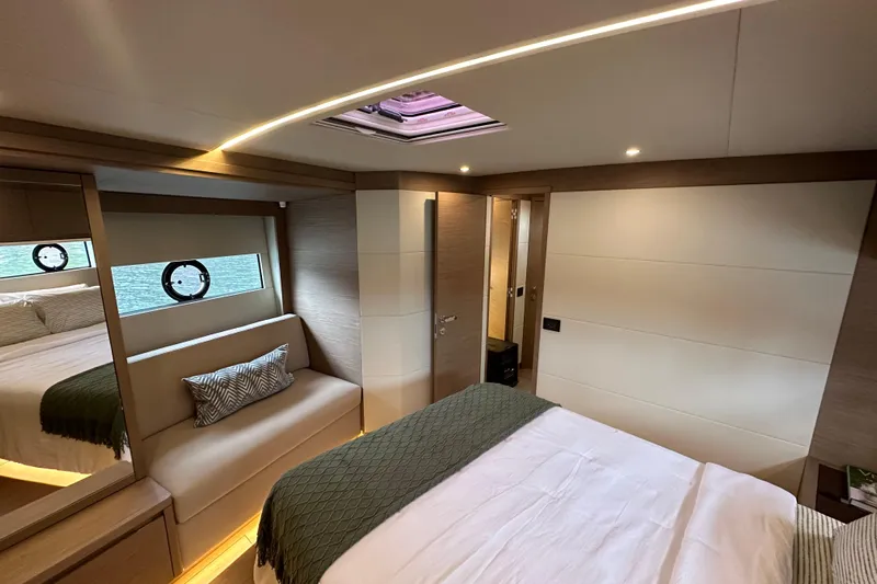  Yacht Photos Pics Luxurious interior of 2026 Pardo Yachts GT52, featuring elegant bedroom design and modern lighting.