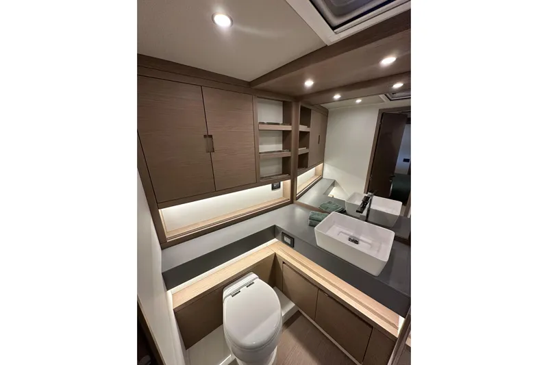  Yacht Photos Pics Luxurious bathroom interior of 2026 Pardo Yachts GT52 with modern fixtures and elegant cabinetry.