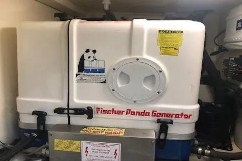  Yacht Photos Pics Fischer Panda generator in a 2009 Scout 350 Abaco boat engine room.