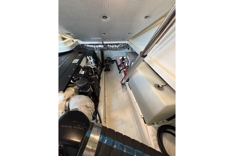 Hannah E Yacht Photos Pics Engine compartment of a 2018 Back Cove 30 boat, showcasing mechanical components.