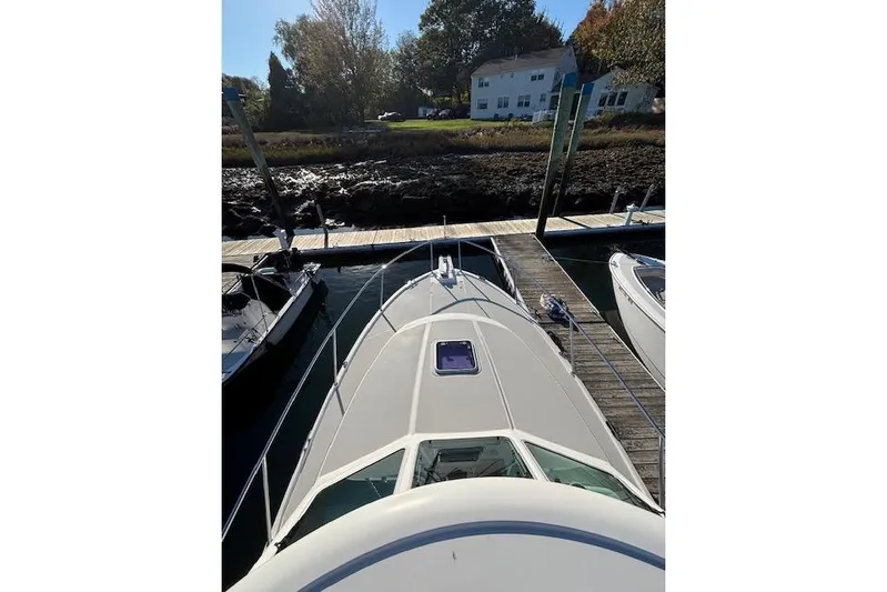 Hannah E Yacht Photos Pics 2018 Back Cove 30 boat docked at marina, viewed from above.