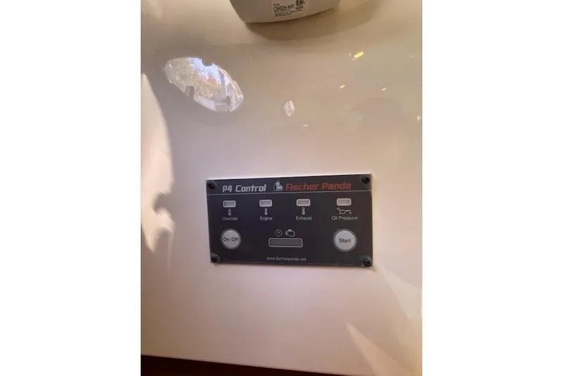 Hannah E Yacht Photos Pics Control panel of a 2018 Back Cove 30 boat featuring Fischer Panda PQ Control.