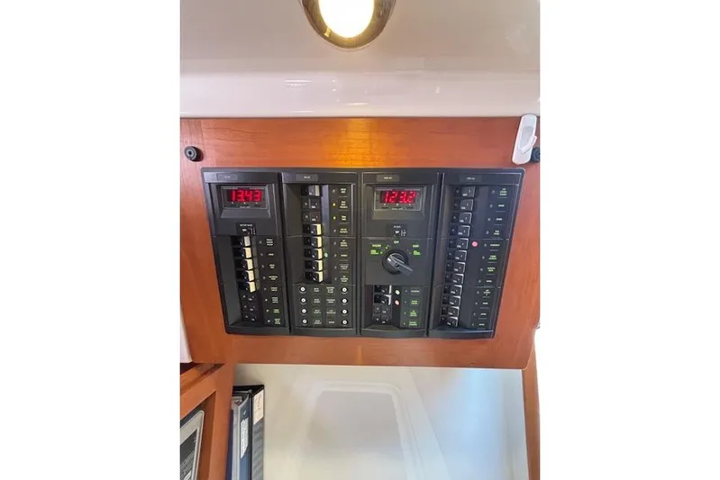 Hannah E Yacht Photos Pics Electrical panel of a 2018 Back Cove 30 boat with digital displays and switches.