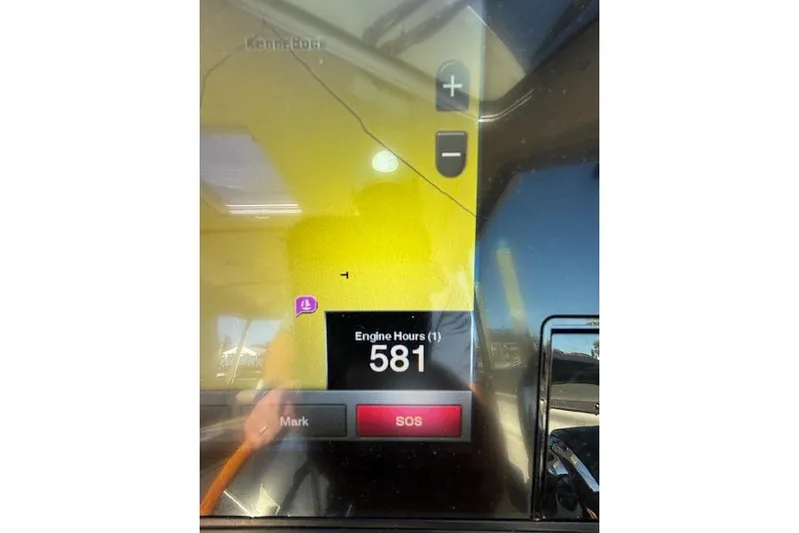 Hannah E Yacht Photos Pics Display screen showing 581 engine hours on a 2018 Back Cove 30 boat.