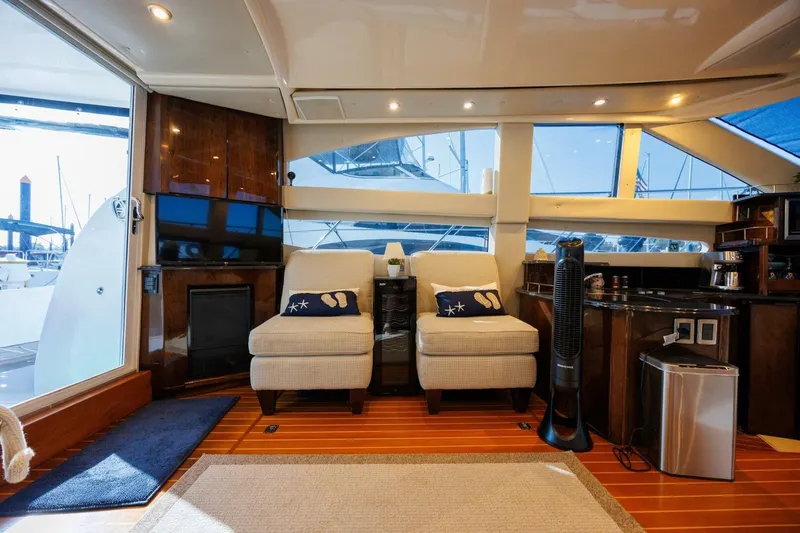 Why Knot Yacht Photos Pics Interior of 2010 Meridian 391 Sedan yacht with cozy seating and modern amenities.